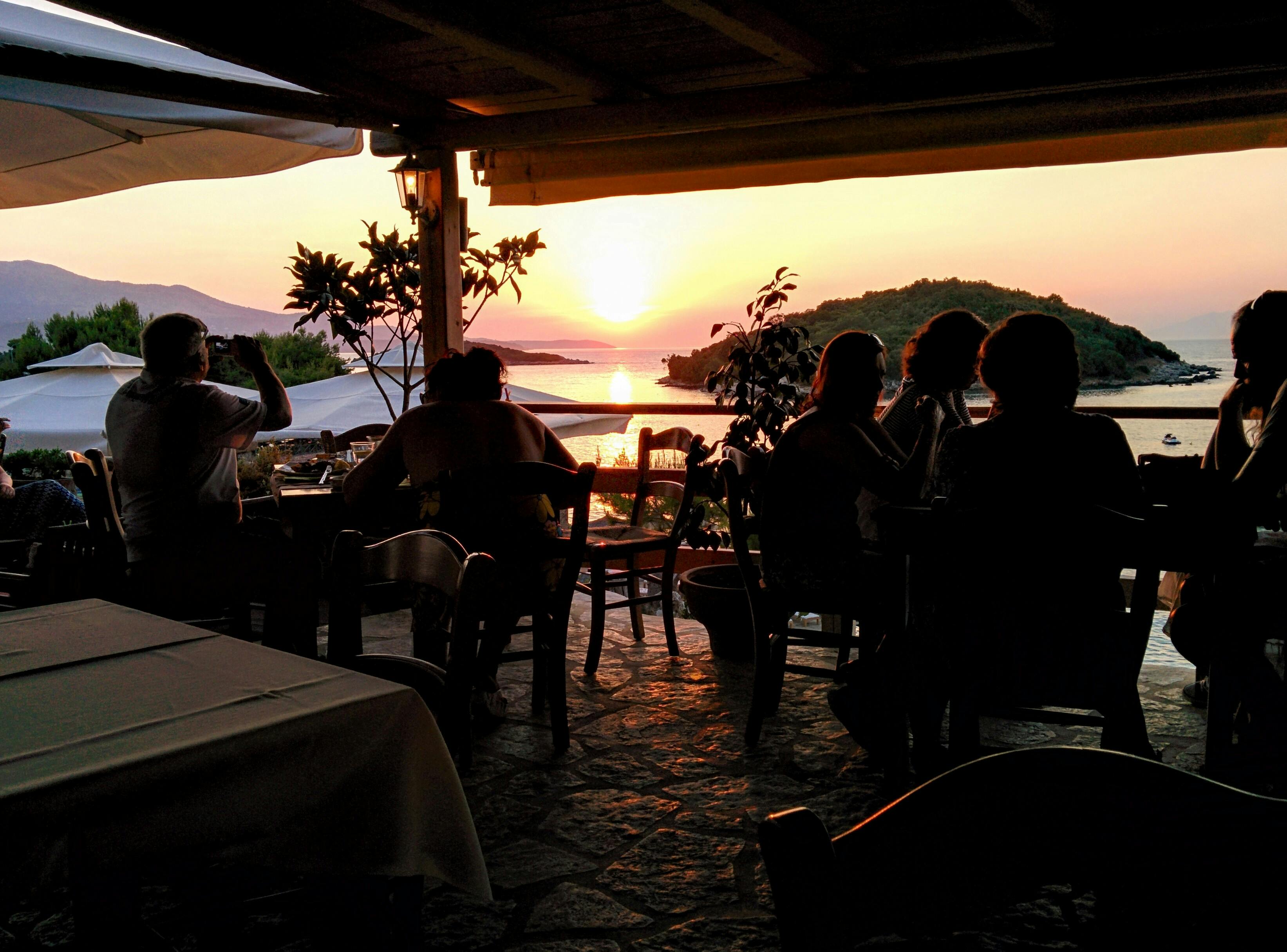 island restaruant at sunset Photo by Daniel Frese: https://www.pexels.com/photo/people-under-shed-watch-sunset-along-the-island-131925/